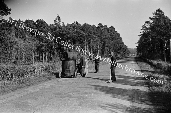 MEN REPAIRING ROAD